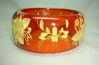 1950s Style Chunky Clear Amber  Lucite Reverse Carved Flower Bangle